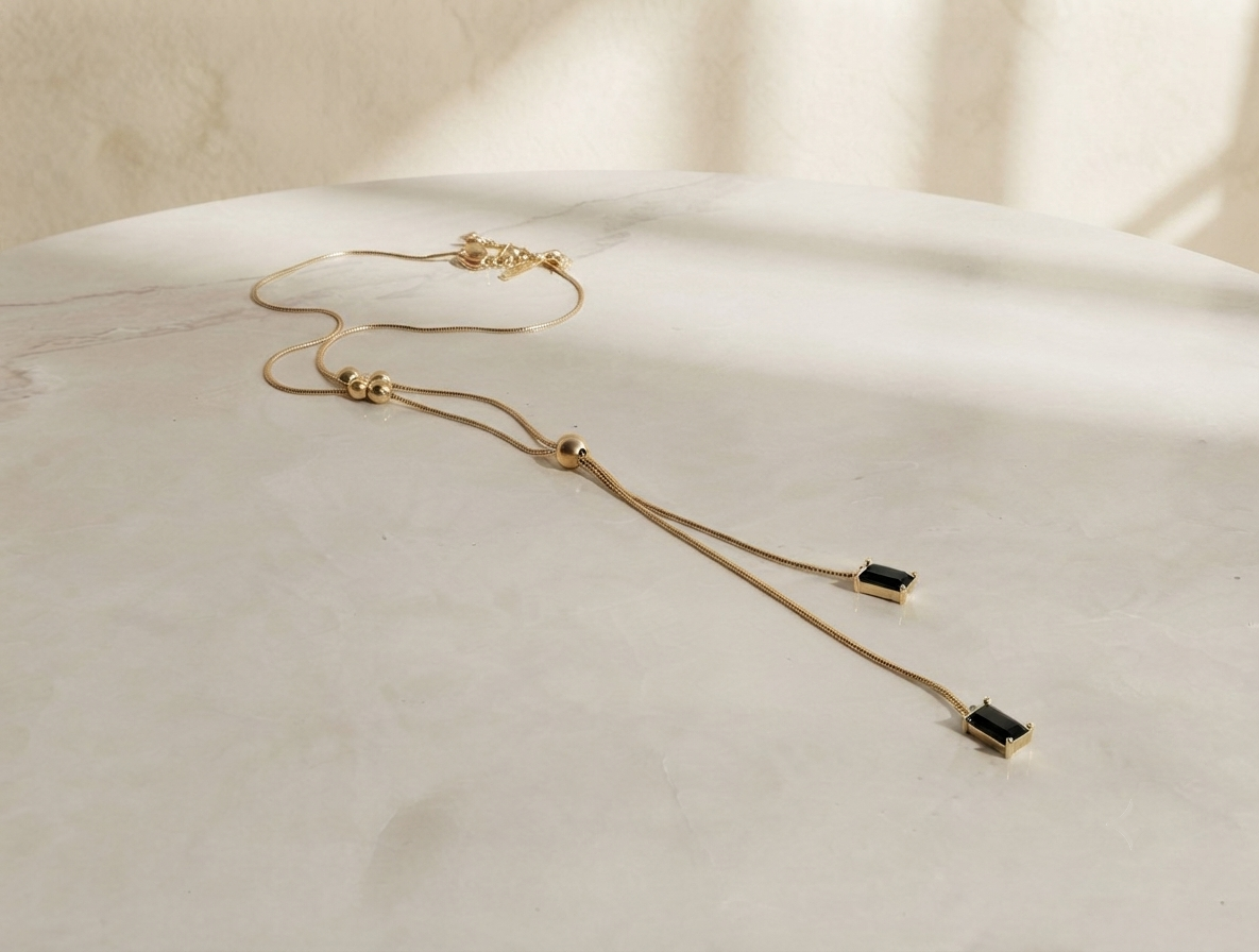 Elegant Gold-Plated Black Stone Pendant with Extension Chain