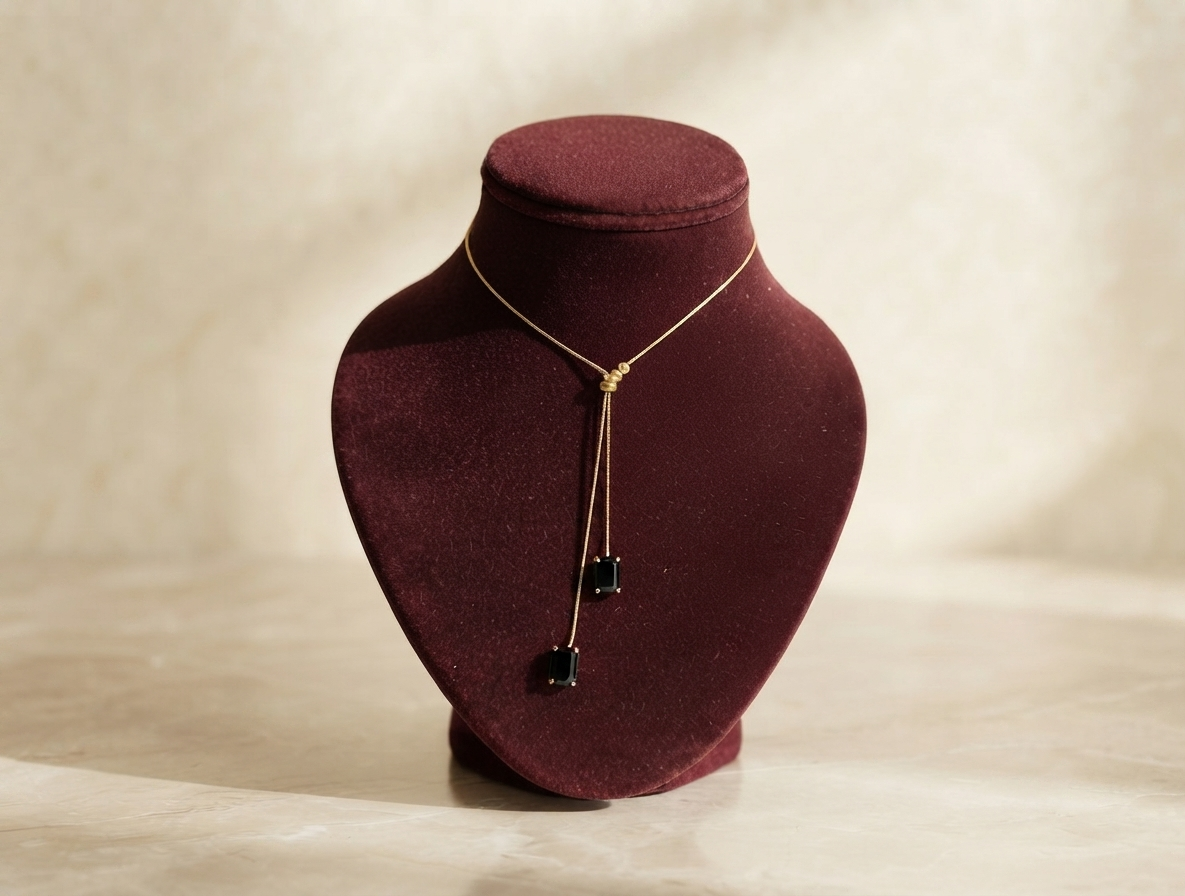 Elegant Gold-Plated Black Stone Pendant with Extension Chain